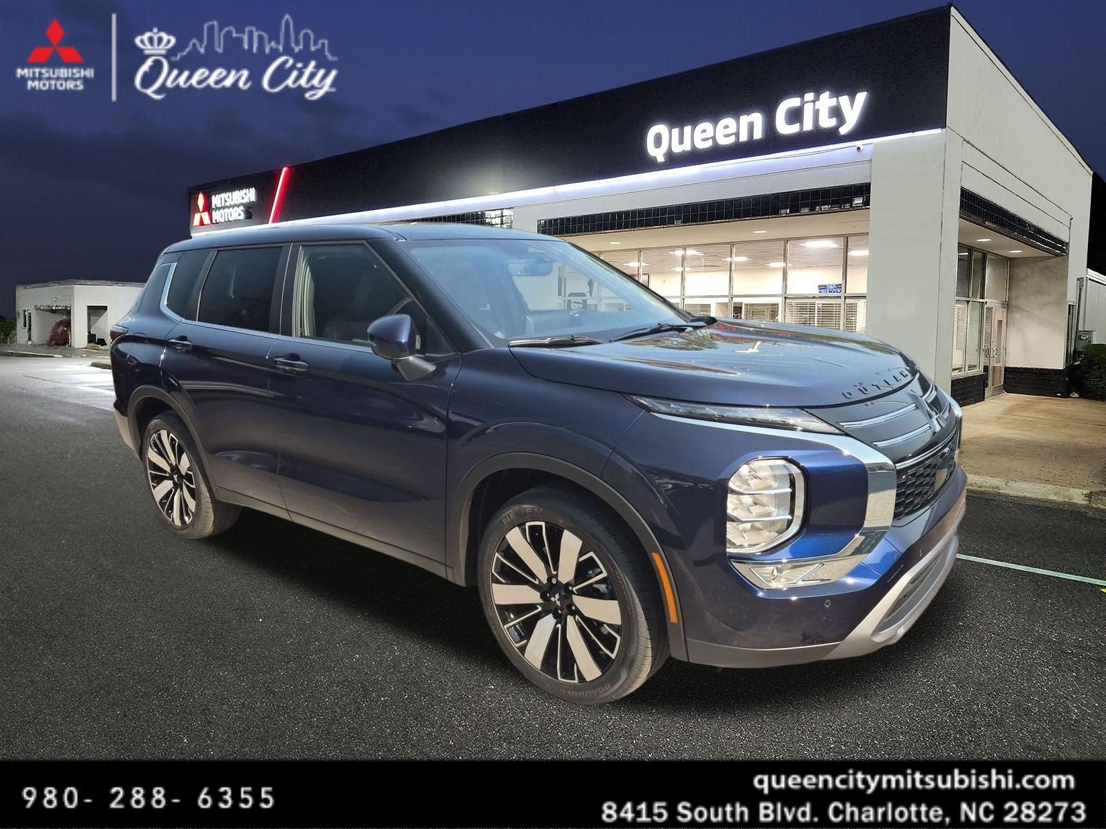 2026 Mitsubishi Outlander SE in Cosmic Blue Metallic — front three-quarter view