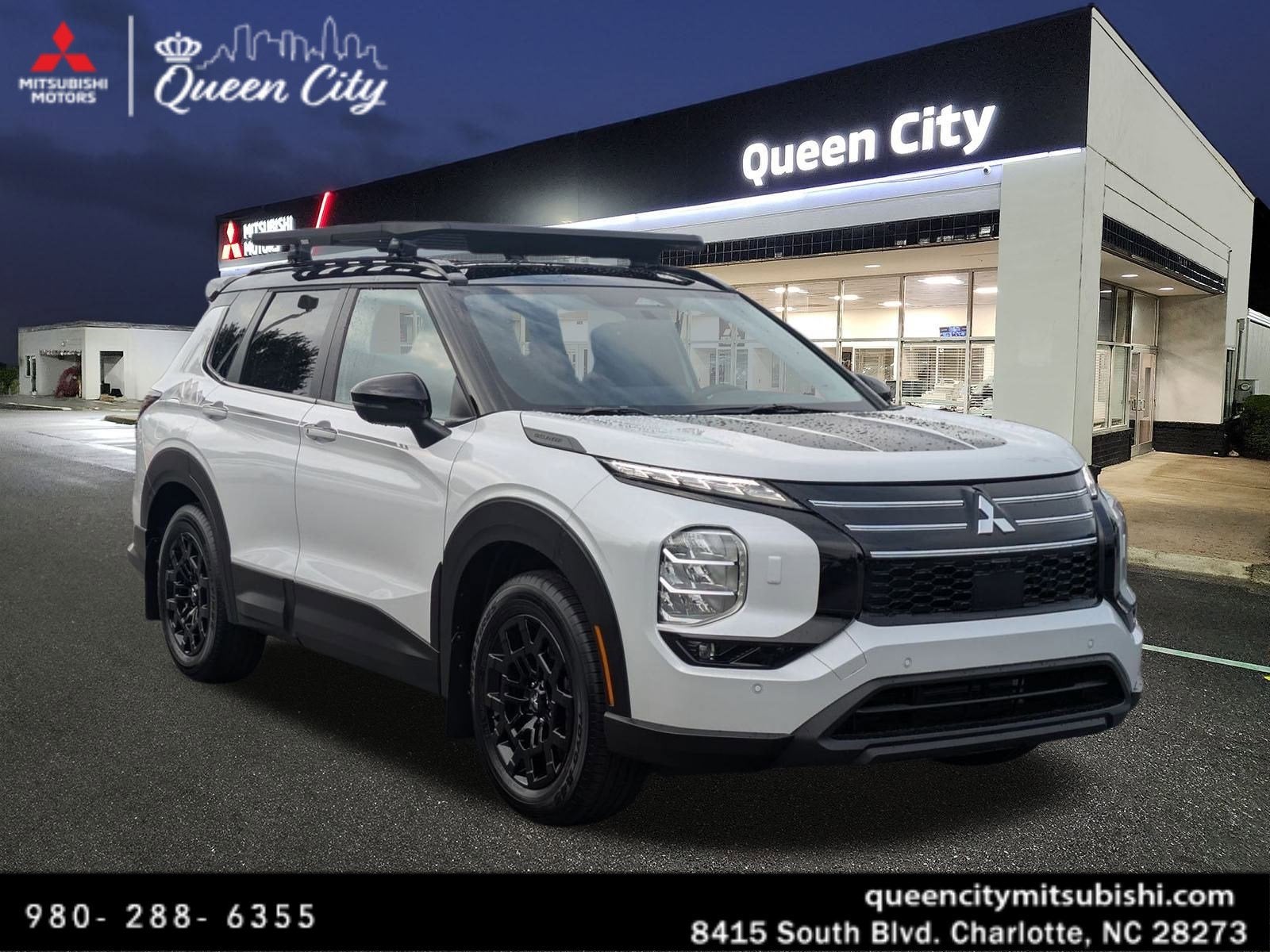 2025 Mitsubishi Outlander Trail Edition in White Diamond/Black Roof — front three-quarter view
